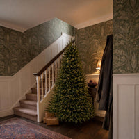 6ft tree at the foot of the stairs